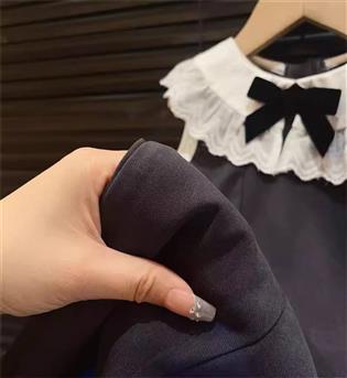 28202959-پیراهن دخترانه حلقه ای دور یقه گیپور و پاپیون مشکی